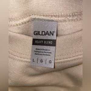 tan crew neck sweat shirt with morgan wallen song title on it. size large